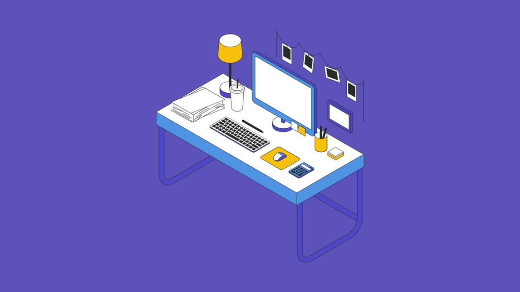 A desk of a remote worker, complete with a monitor, keyboard, lamp, calculator, papers