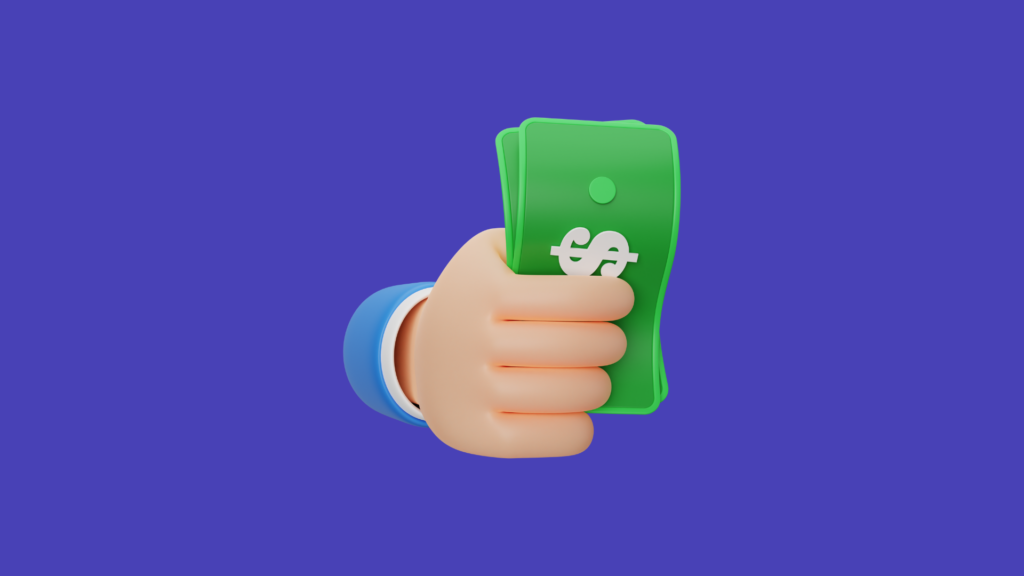 a person holding cash
